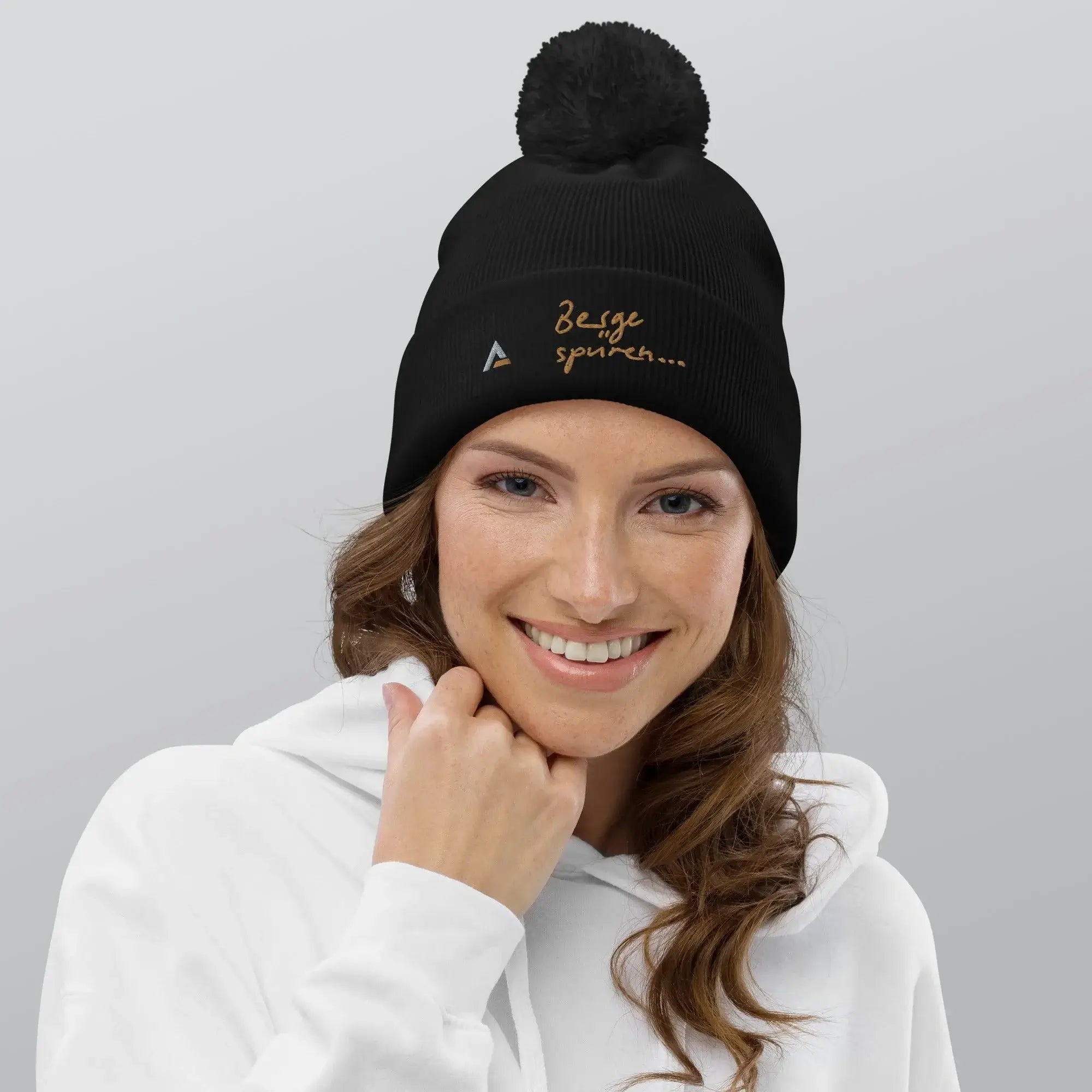 Bommel-Beanie AAA (Schwarz-Gold)